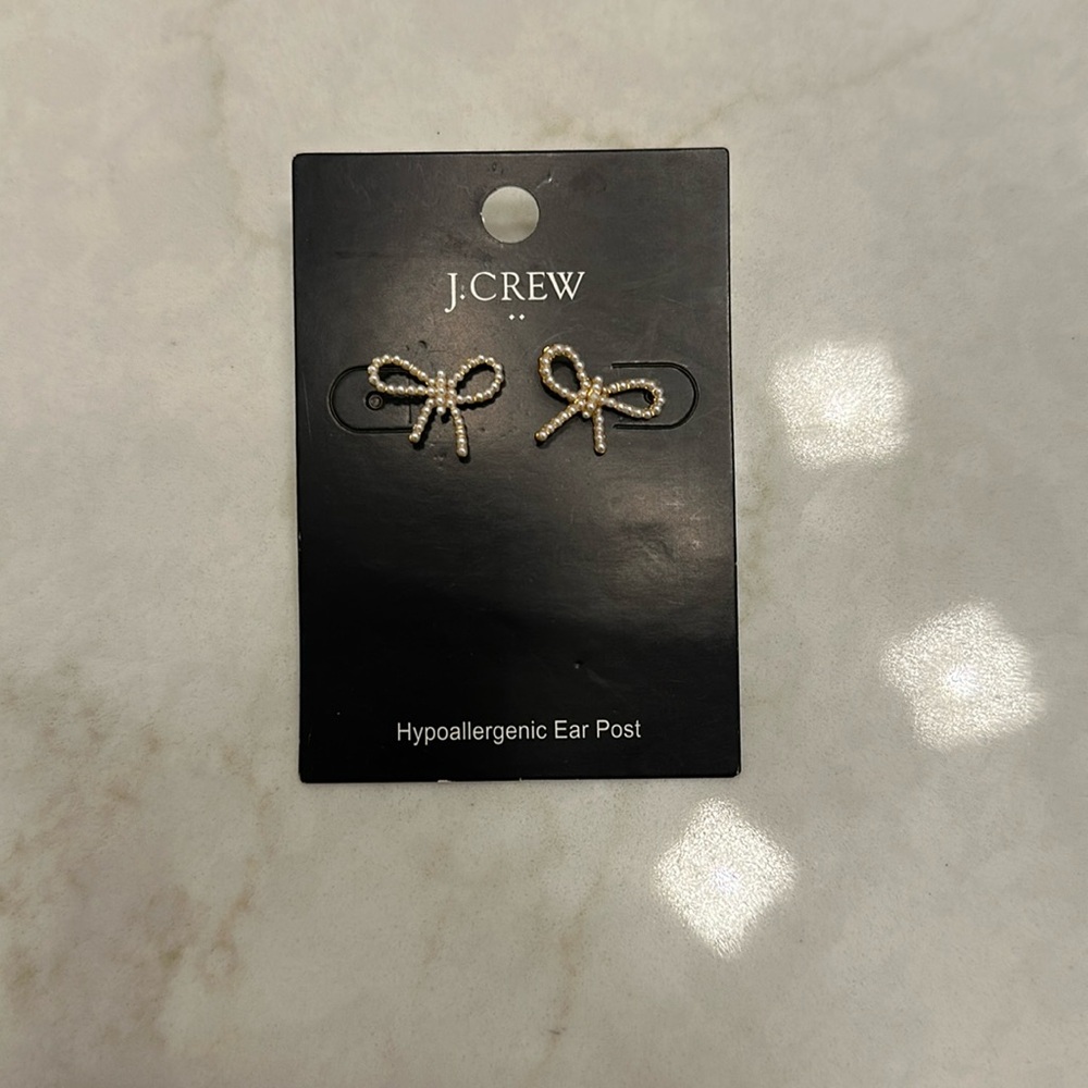 NWT. J.Crew pearl bow earrings. Never worn.